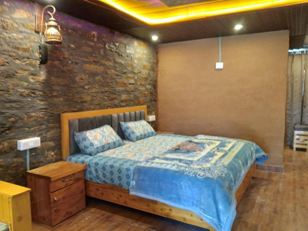 Nature Villaas Basa Homestay Pauri Luaran gambar