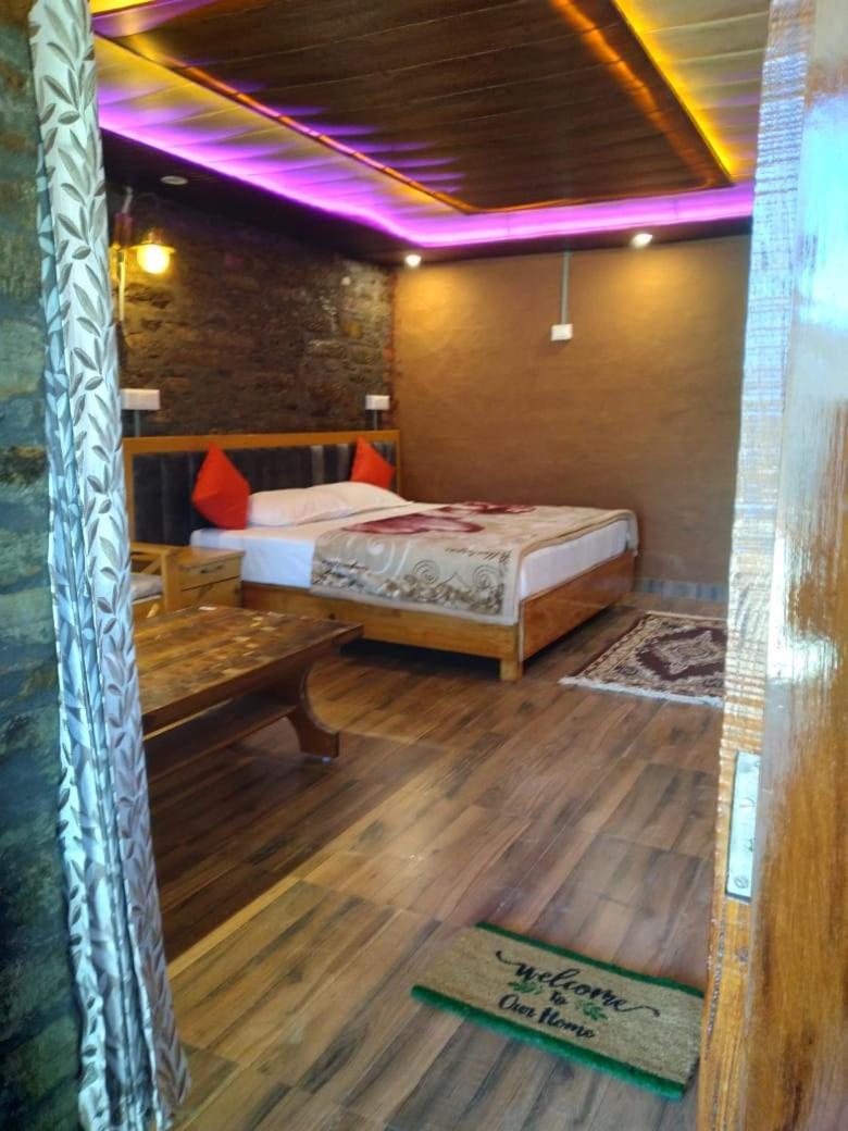 Nature Villaas Basa Homestay Pauri Luaran gambar